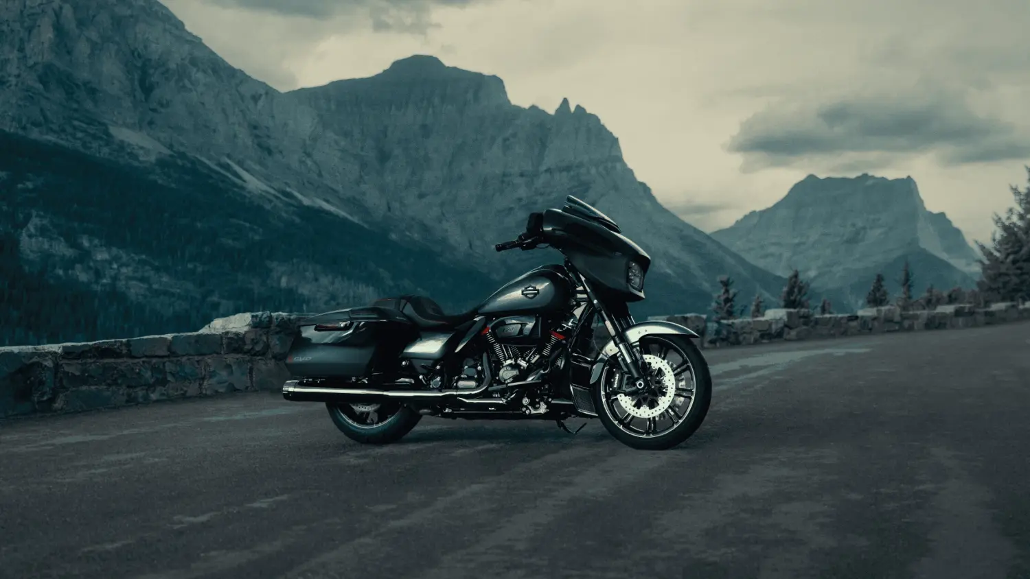 A 2025 Harley-Davidson® CVO™ Street Glide® rests on the roadside in Stuart, FL, highlighting its iconic style and craftsmanship.