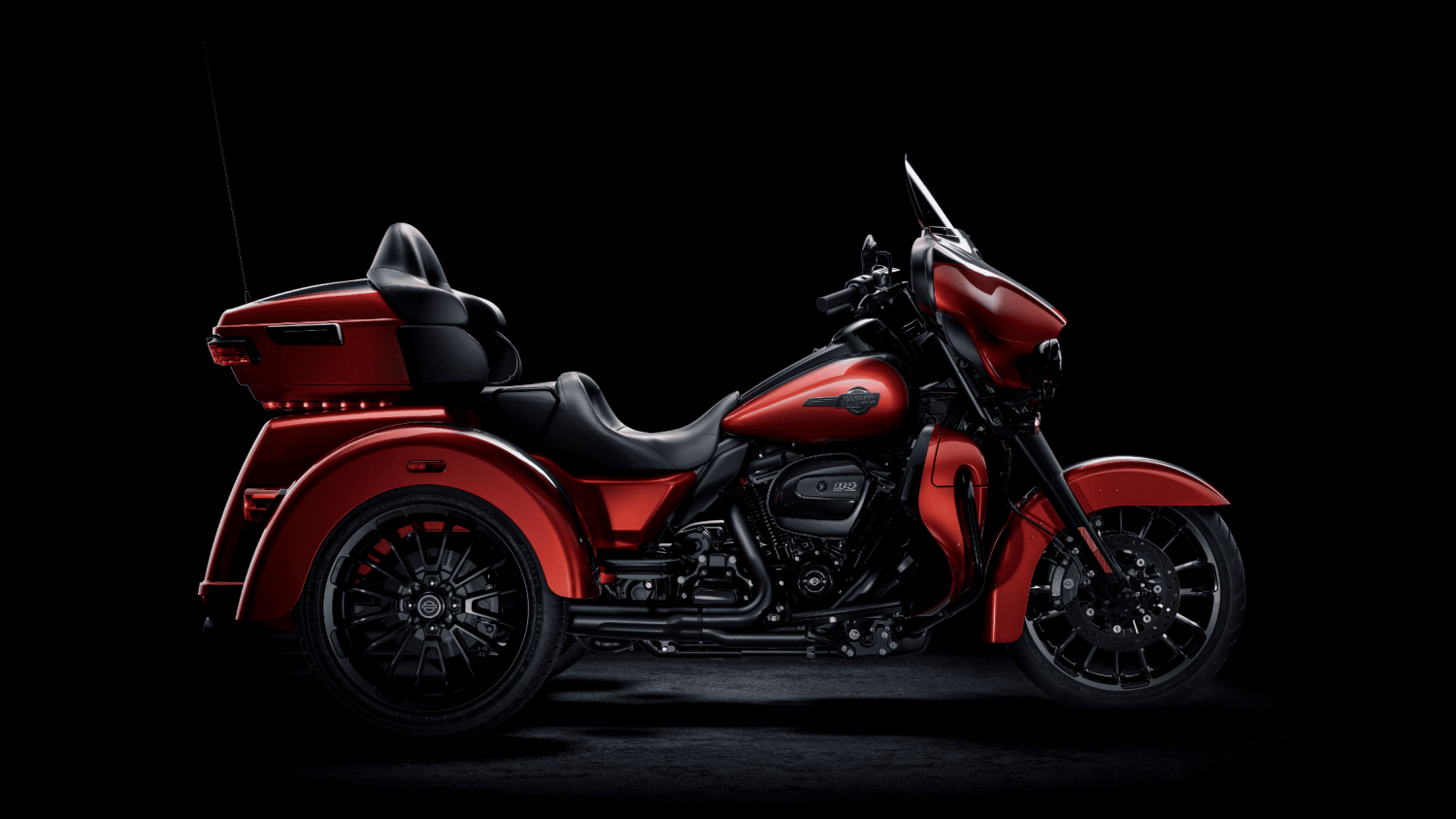 2025 Harley-Davidson® Tri Glide® Ultra in West Palm Beach FL featuring vivid red paint, rear trunk storage, and Milwaukee-Eight® 114 engine