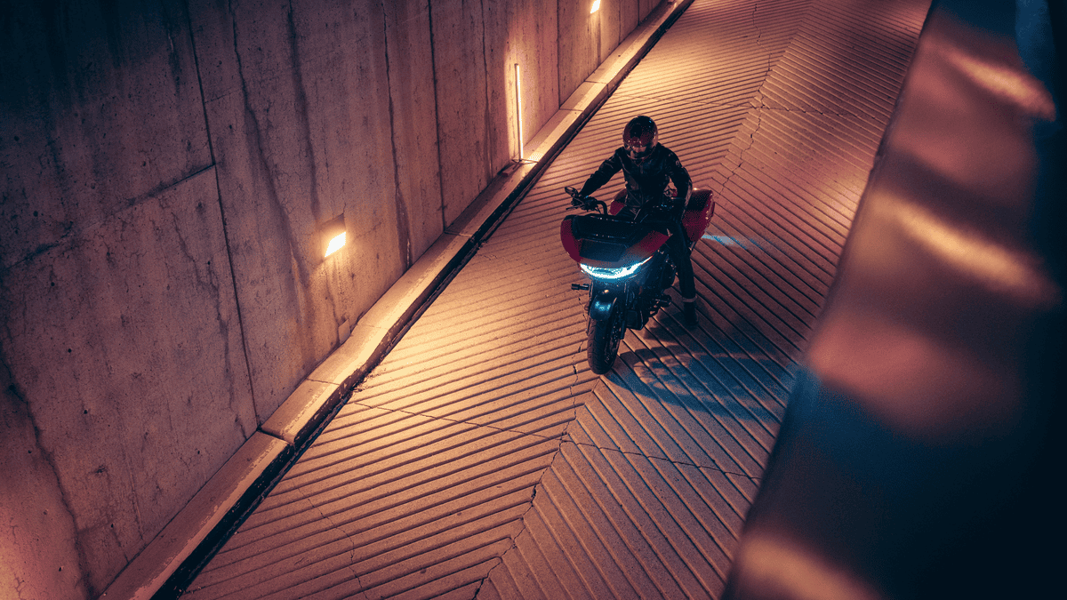 2025 Harley-Davidson® CVO™ Road Glide® ST in West Palm Beach FL shown in a dim tunnel with LED lights glowing, emphasizing power and urban style