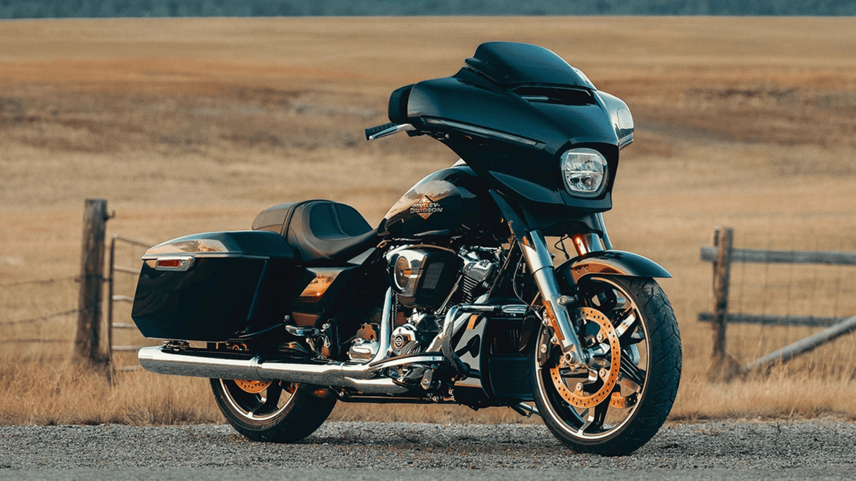 2025 Harley-Davidson® Street Glide® parked in a scenic field near Orlando, FL—iconic style with long-distance comfort