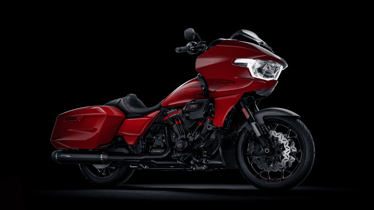 2025 Harley-Davidson® CVO™ Road Glide® ST in red, built for performance cruising, parked near Orlando FL.