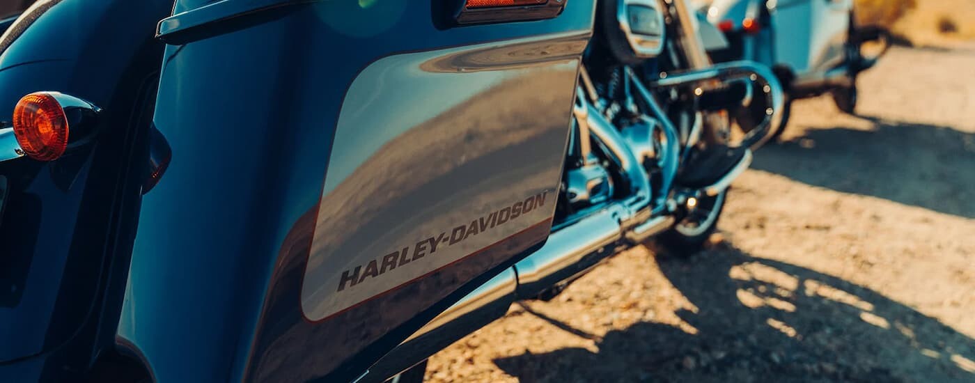 A close up of the side of a blue 2023 Harley-Davidson Street Glide Limited is shown.