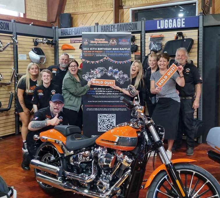 May be an image of 7 people, motorcycle and text