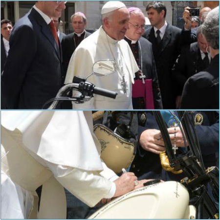 Pope Francis' Harley Davidson motorcycle set for sale in Paris.