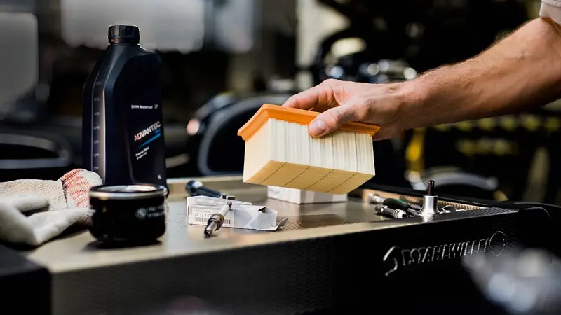 Man inspecting an air filter