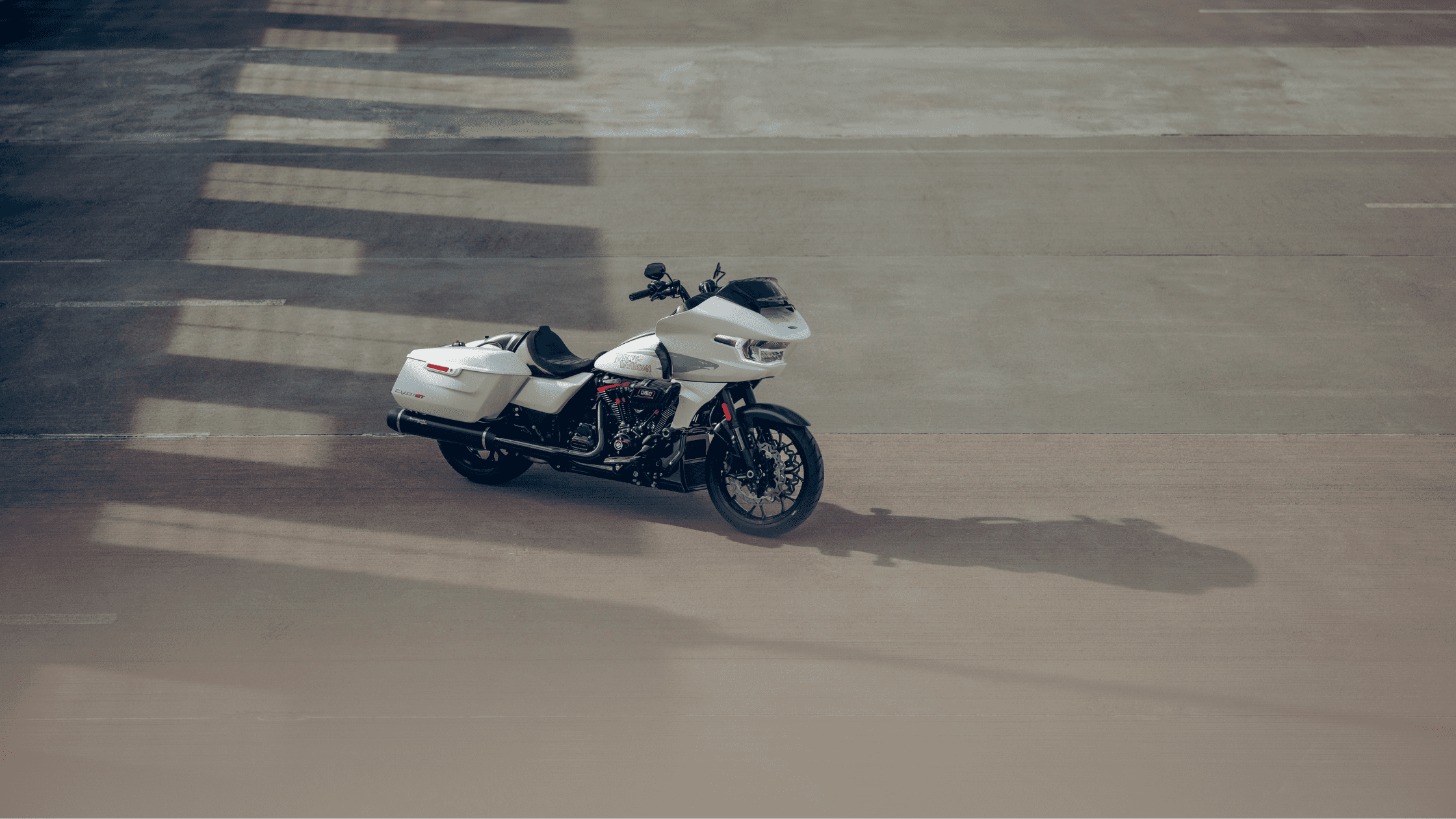 2024 CVO™ Road Glide® ST motorcycle parked in an empty urban space
