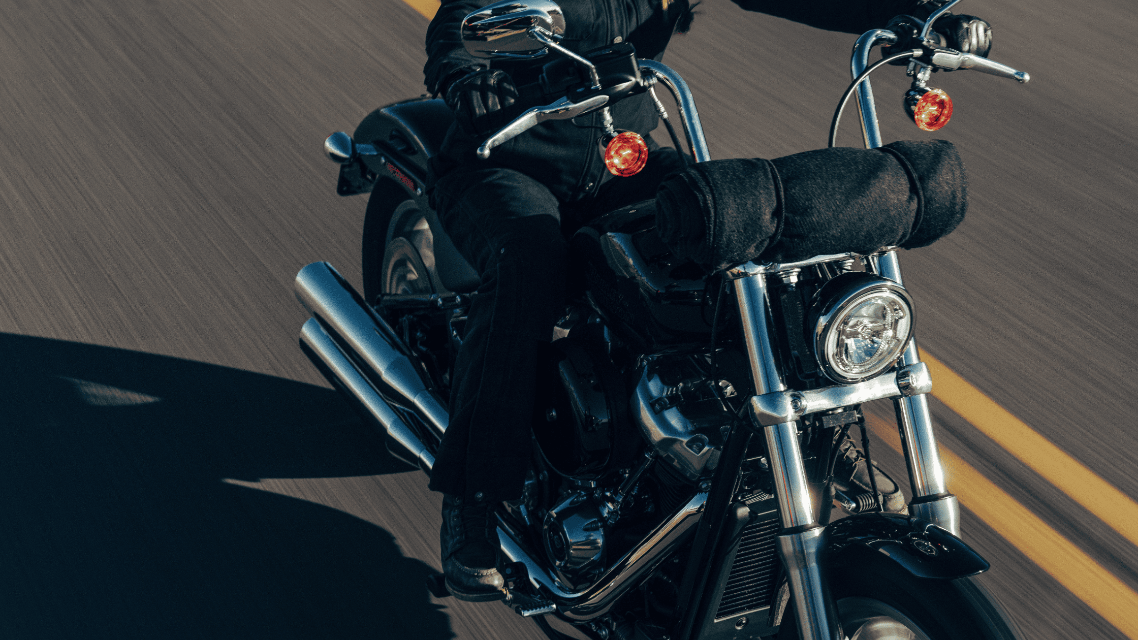 Close-up of a Harley-Davidson Softail® Standard in motion on an open road