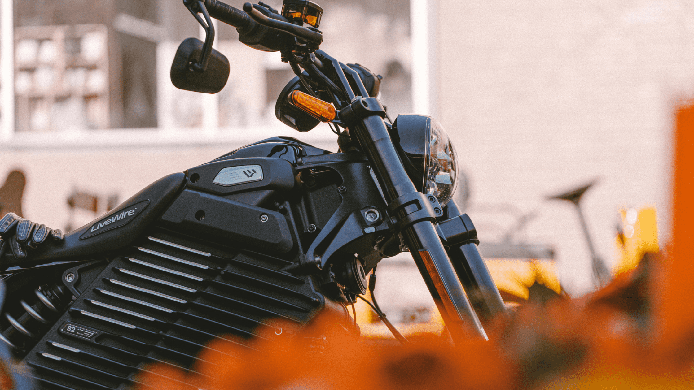 Close-up of a 2024 Harley-Davidson® LiveWire® S2 Mulholland™, showcasing its sleek black electric design and branding