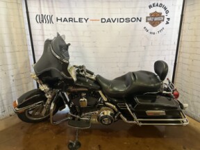 2007 Harley-Davidson<sup>®</sup> Electra Glide® Classic FLHTC Vivid Black thumb 0