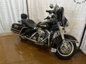 2007 Harley-Davidson<sup>®</sup> Electra Glide® Classic FLHTC Vivid Black thumb 1