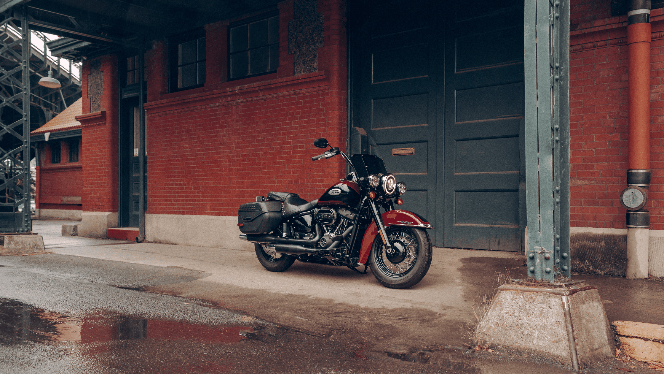 2024 Harley-Davidson® Heritage Classic 114 parked by a red brick building