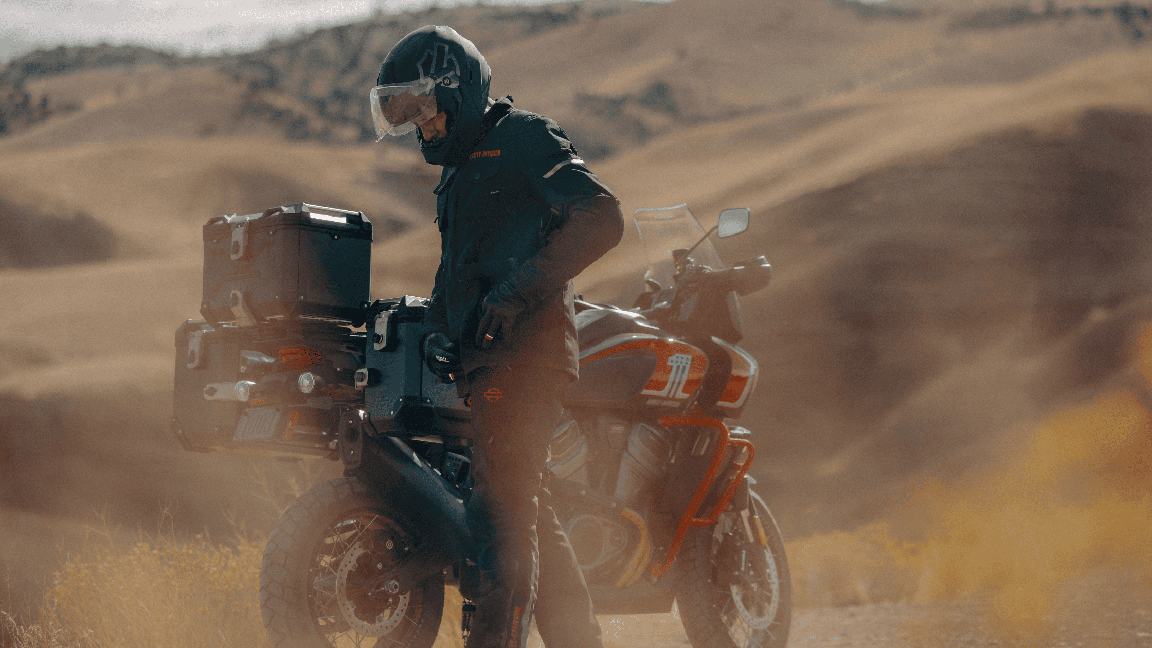 2024 Harley-Davidson® CVO™ Pan America® equipped for adventure, set in rugged terrain