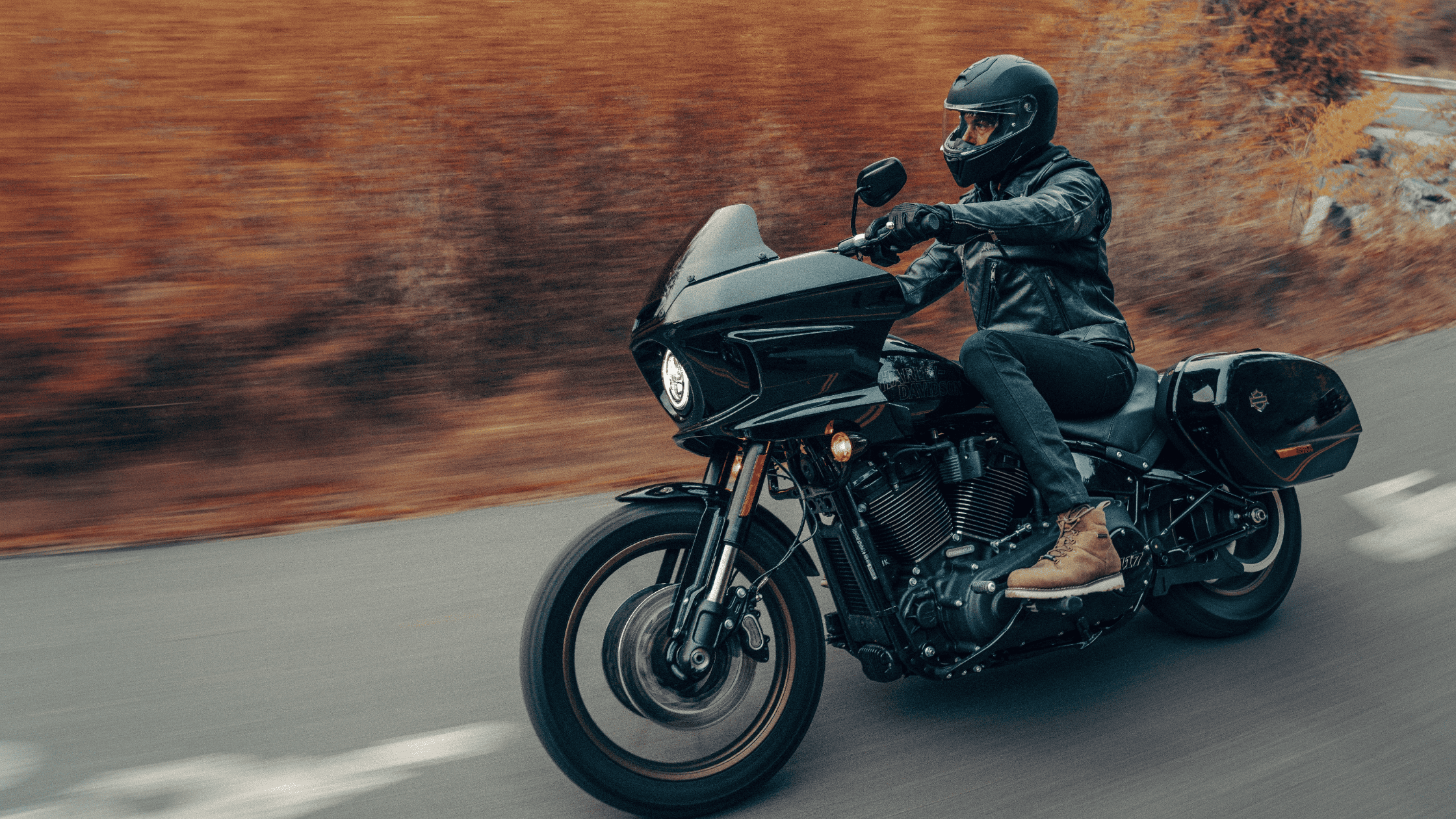 2024 Harley-Davidson® Low Rider® ST cruising through scenic roads, built for performance