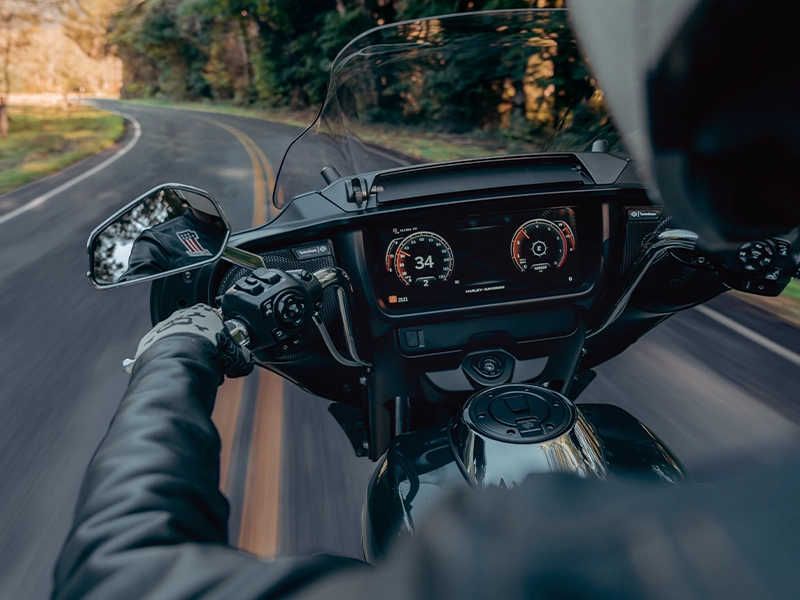 First person view of a rider on a Harley-Davisdon looking at the speedometer