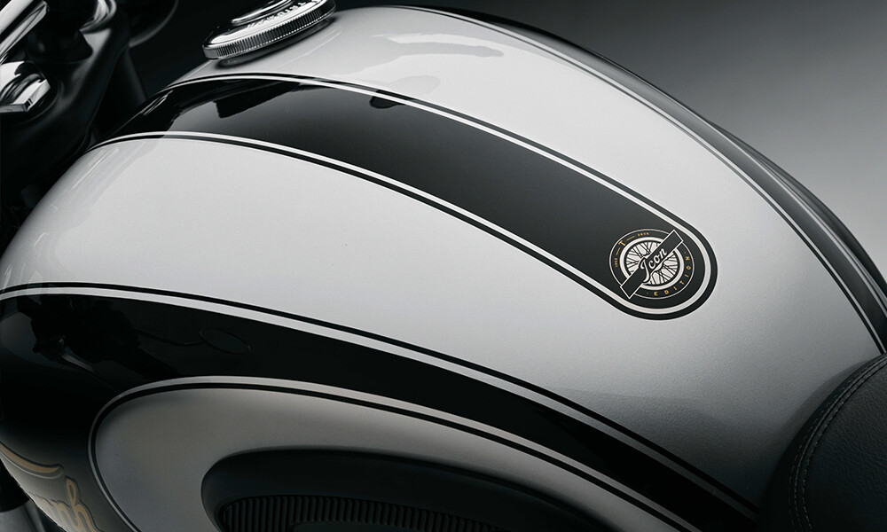 Close up top down image of a Triumphs fuel tank in aluminium silver featuring the icon edition logo in the centre