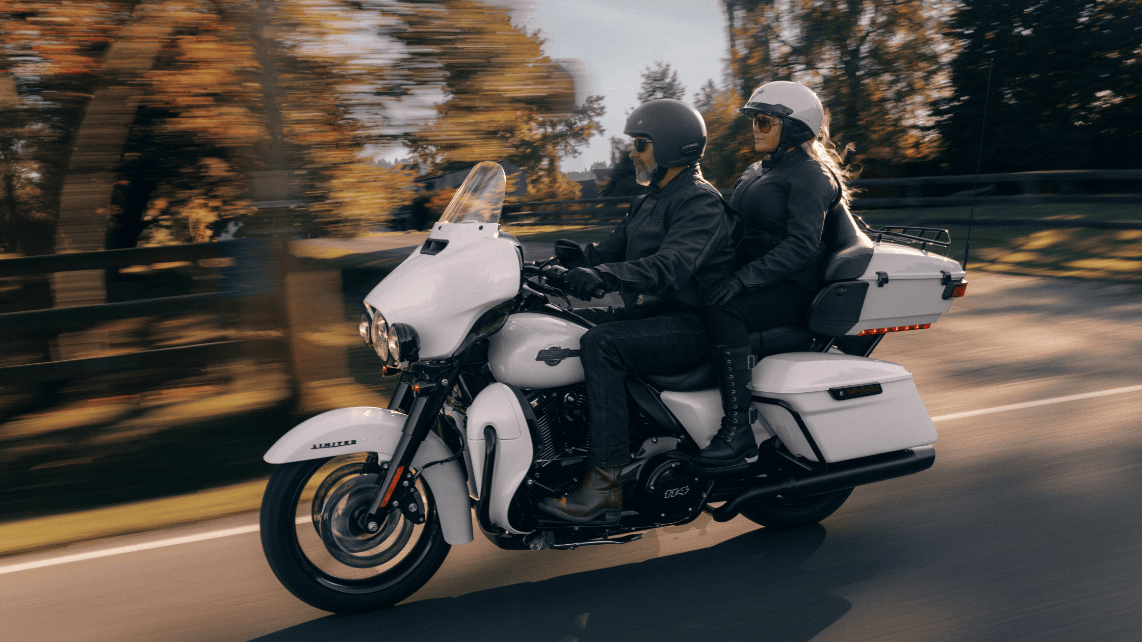 2024 Harley-Davidson® Ultra Limited® with two riders cruising scenic roads