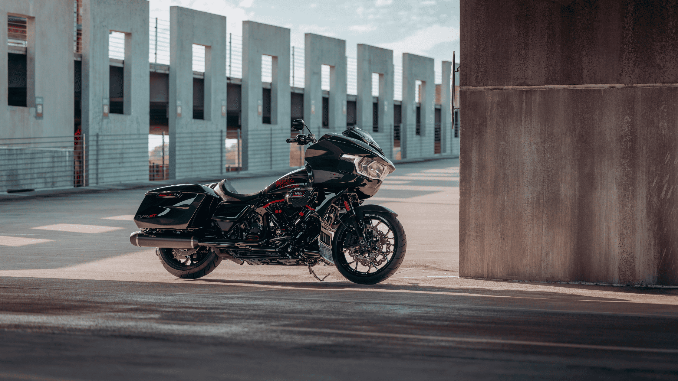 2024 Harley-Davidson® CVO™ Road Glide® ST in black parked in urban setting.