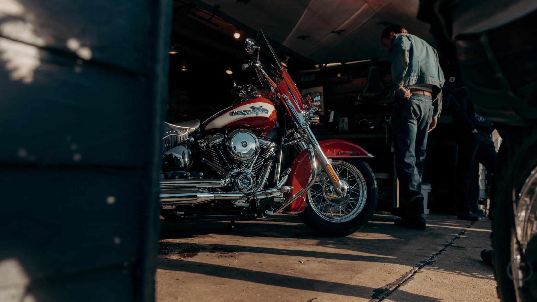 Harley-Davidson Hydra-Glide Revival motorcycle parked in a vintage garage.