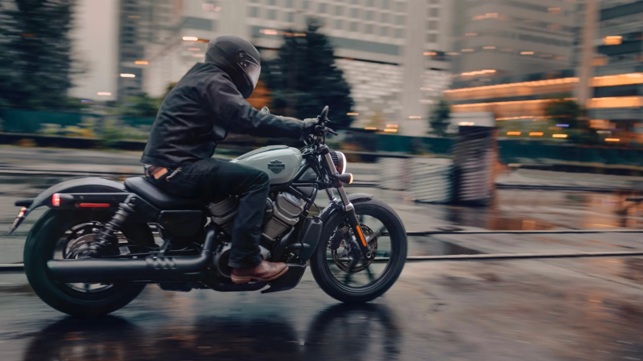 Harley-Davidson® Nightster® in motion, navigating the city streets with style.