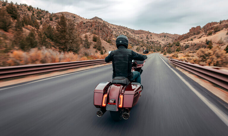2024 Harley-Davidson CVO Road Glide riding away on open road
