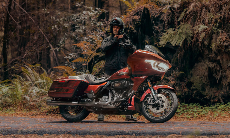 2024 Harley-Davidson CVO Road Glide in a forest with rider