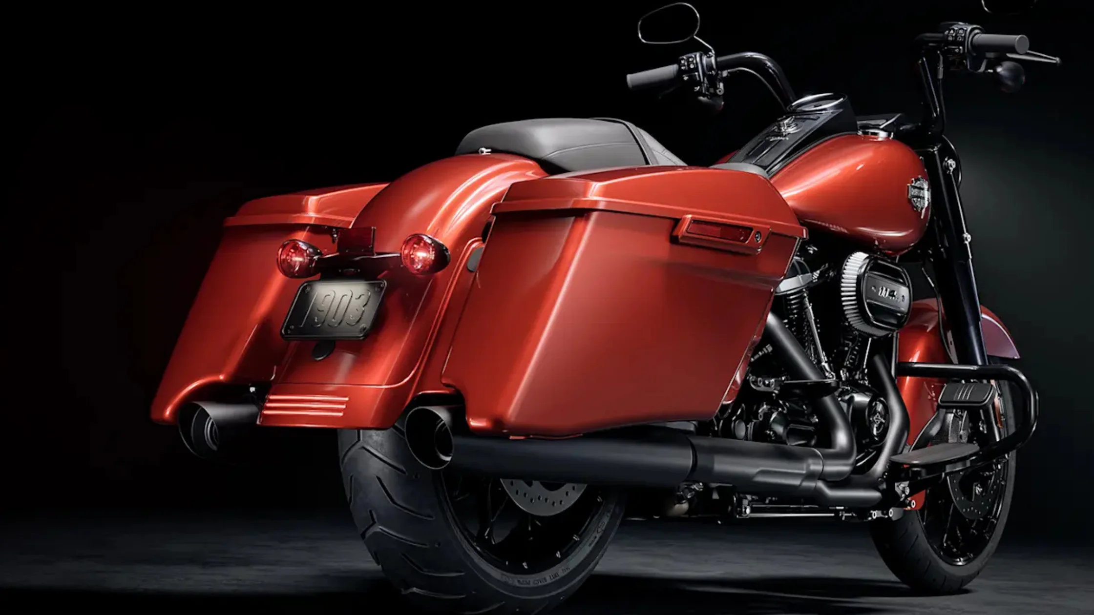 Harley-Davidson Road King Special in glossy red with custom saddlebags.
