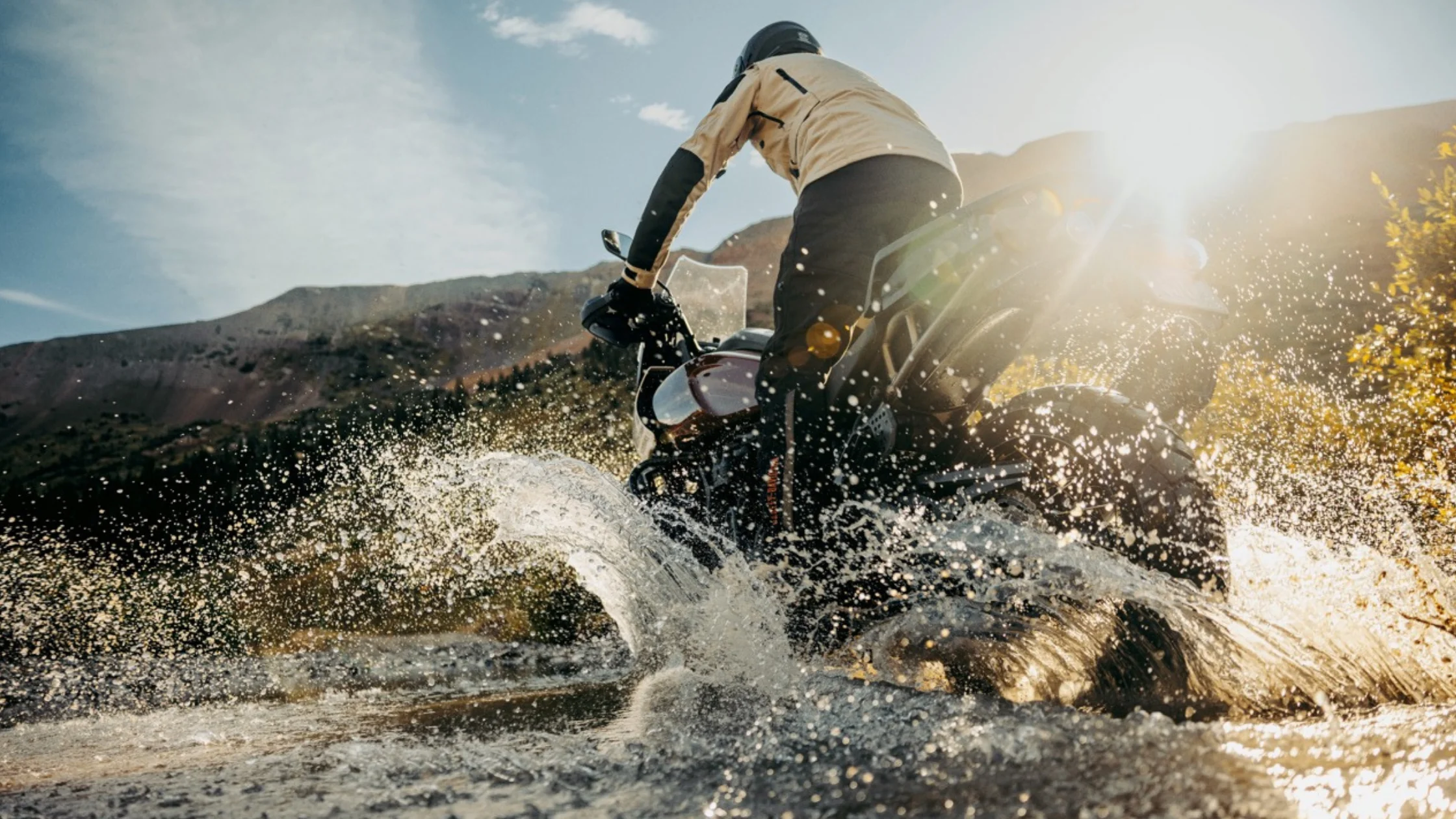 Rider on the 2024 Harley-Davidson Pan America® 1250 Special crossing a stream.