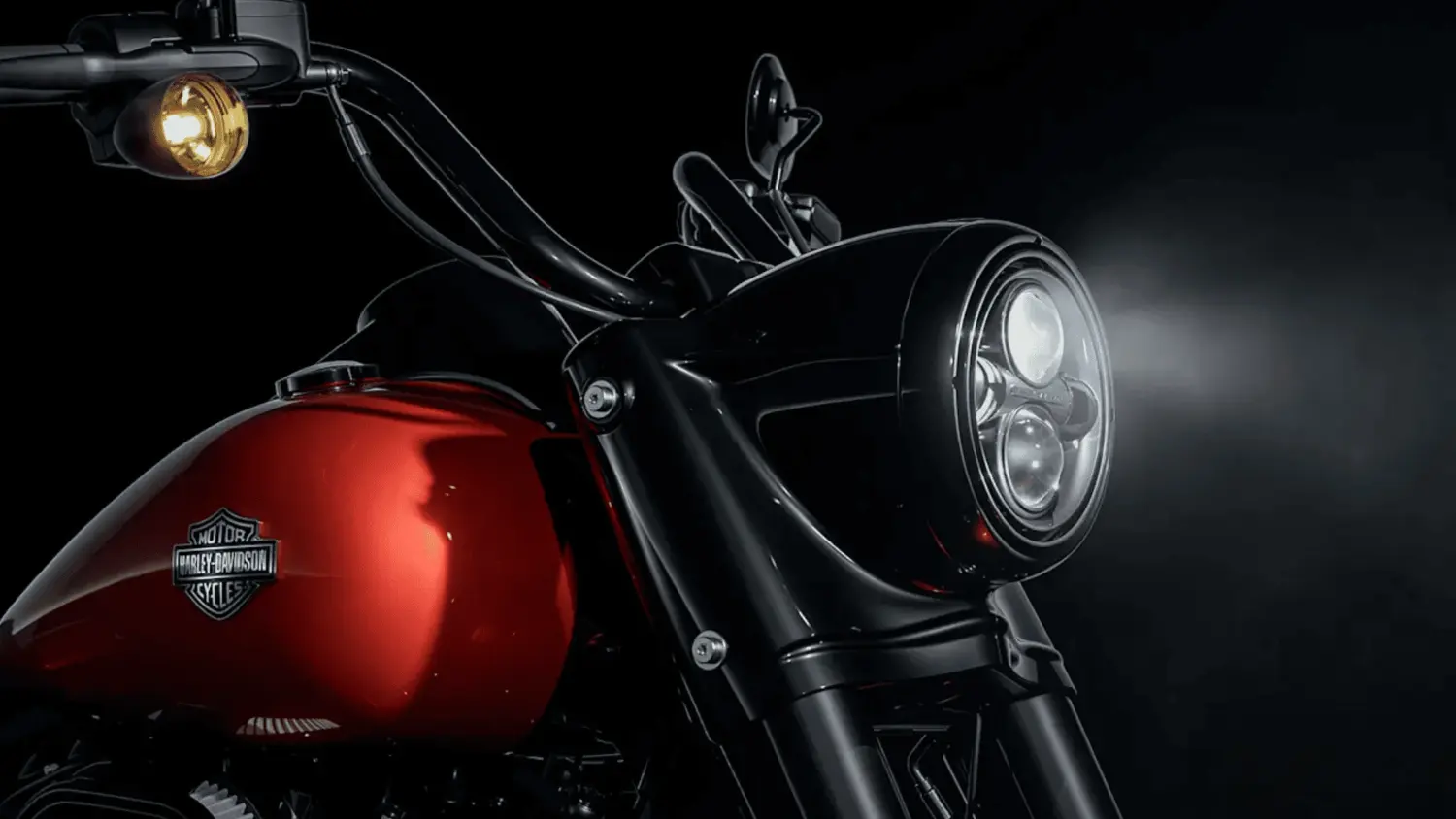 Close-up of a 2025 Harley-Davidson® Road King® Special motorcycle with its headlight illuminated in Stuart, FL.