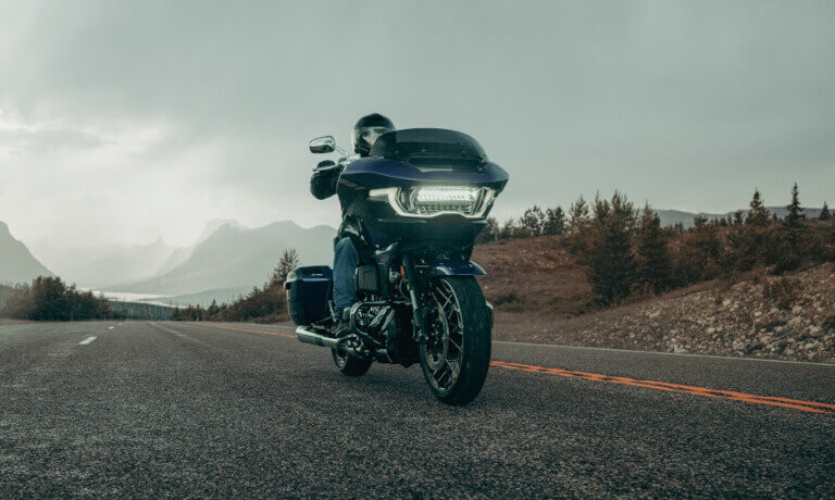 2025 Harley-Davidson CVO Road Glide with rider on highway