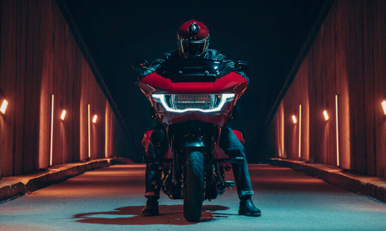 2025 Harley-Davidson CVO Road Glide ST with rider head-on in alley