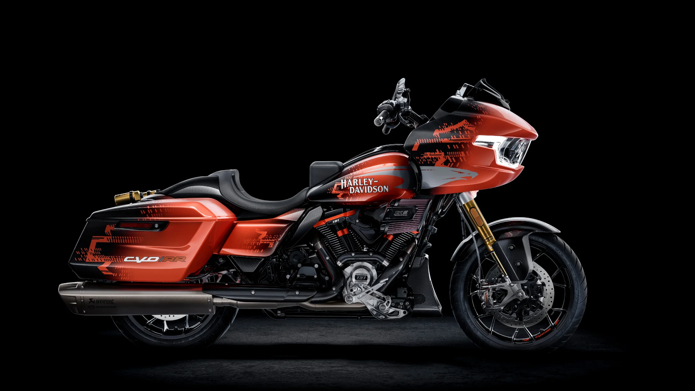 The 2025 Harley-Davidson® CVO™ Road Glide® RR is showcased in a striking side profile against a dark background, emphasizing its aggressive race-inspired design.