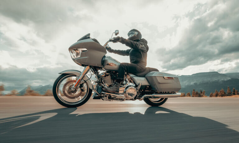 2025 Harley-Davidson Road Glide riding in front of sun