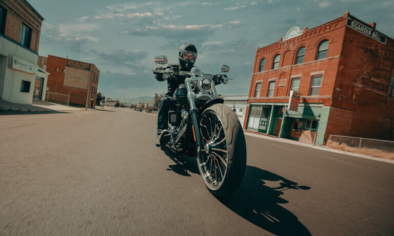 2025 Harley-Davidson Breakout riding head on in town