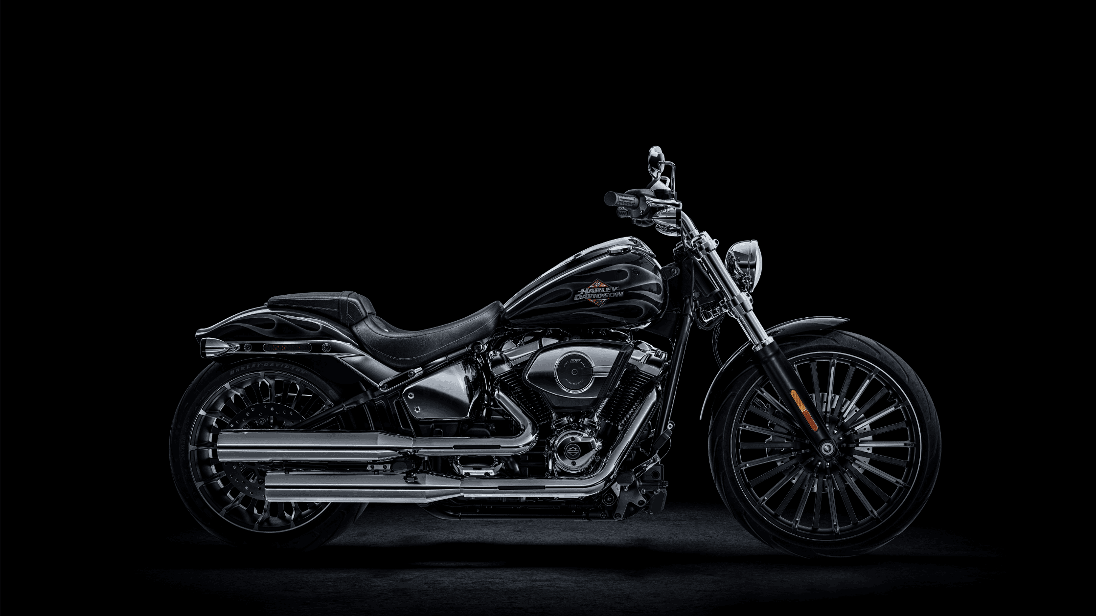 2025 Harley-Davidson Breakout cruiser motorcycle in black with chrome details and custom wheels