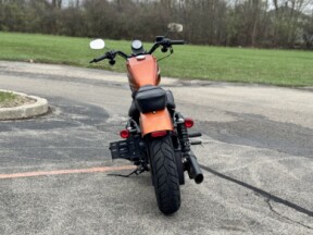 2020 Harley-Davidson<sup>®</sup> Iron 883<sup>™</sup> Scorched Orange/Silver Flux thumb 1