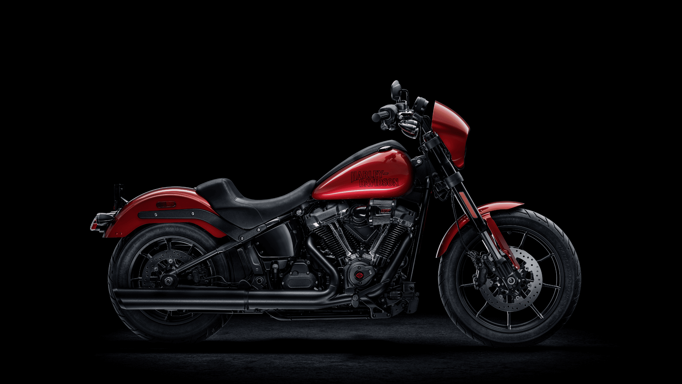 Side view of a red 2025 Harley-Davidson® Low Rider® S performance cruiser motorcycle.