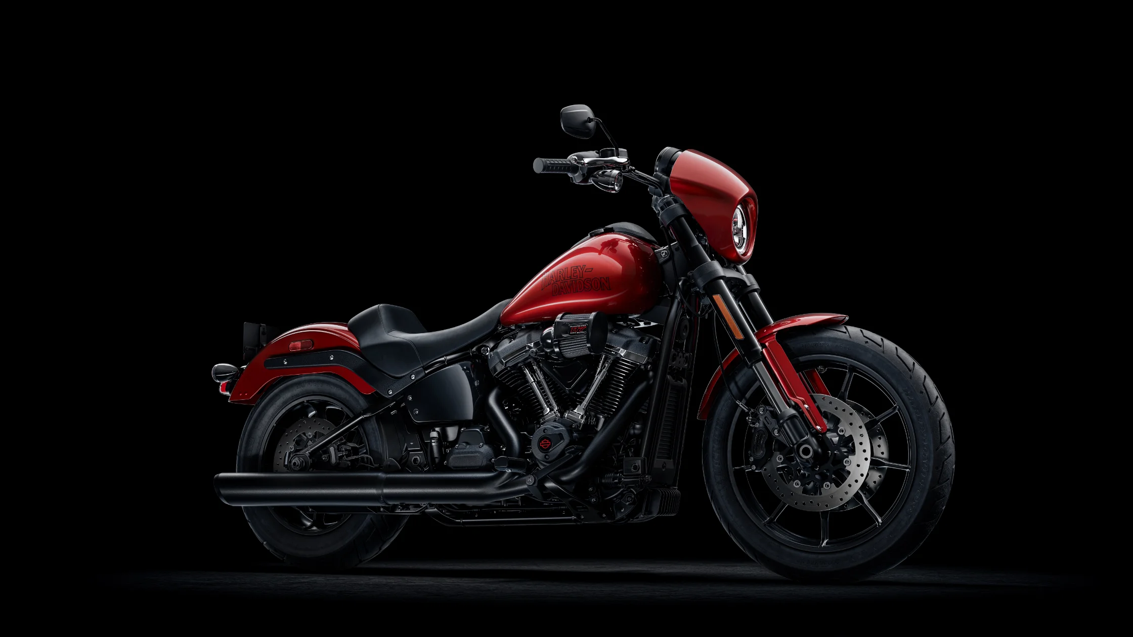 2025 Harley-Davidson® Low Rider S in red and black, aggressive styling, side profile view
