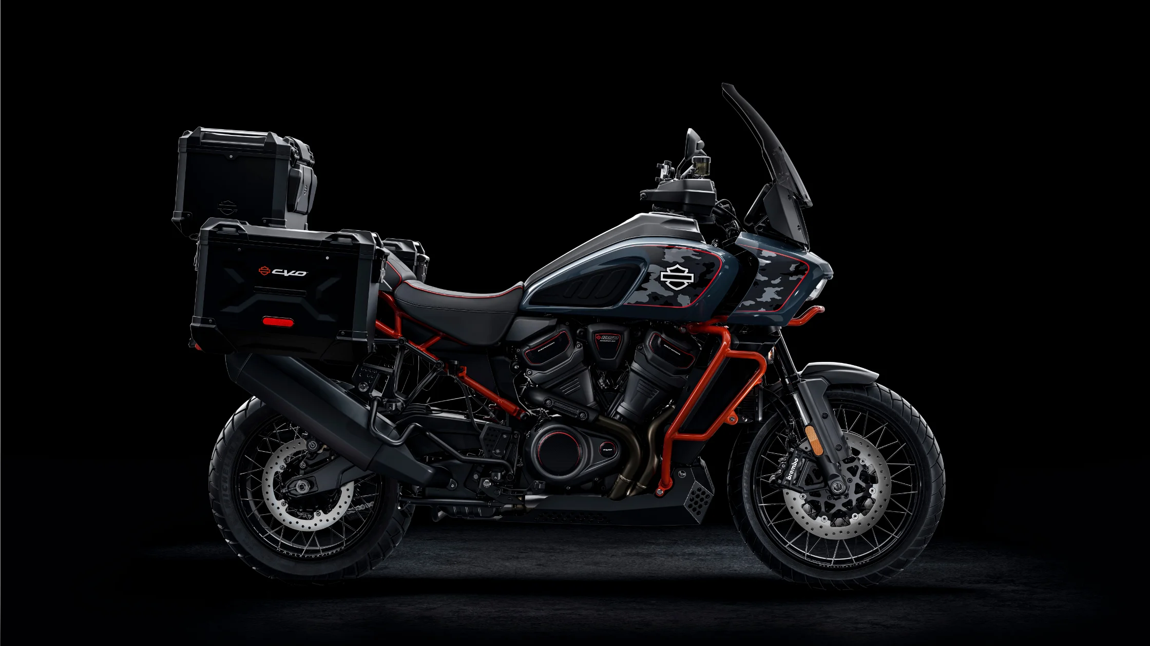 2025 Harley-Davidson® CVO Pan America with luggage cases, side profile on black background