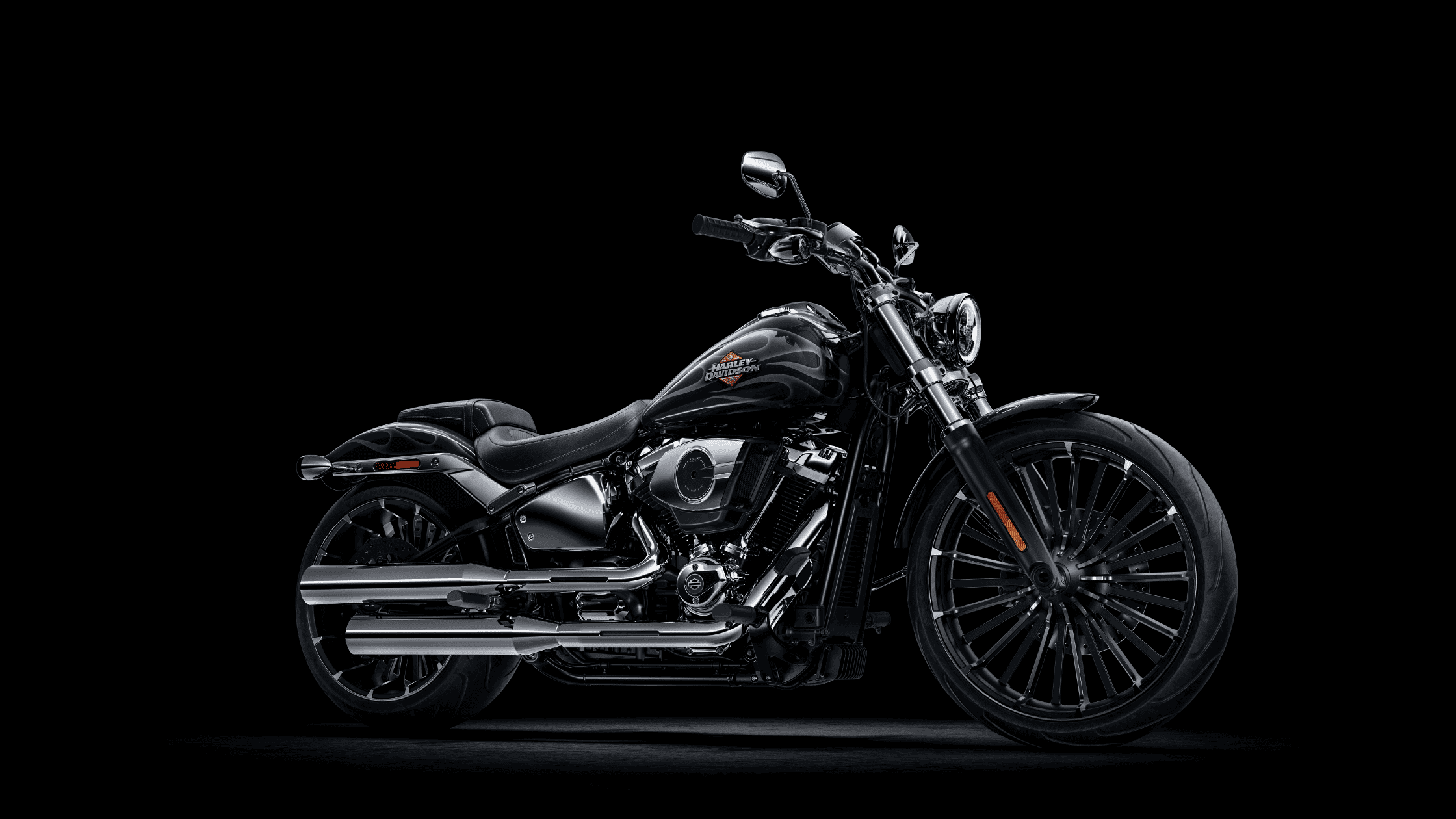 Angled view of a black 2025 Harley-Davidson® Breakout® cruiser motorcycle with chrome accents.