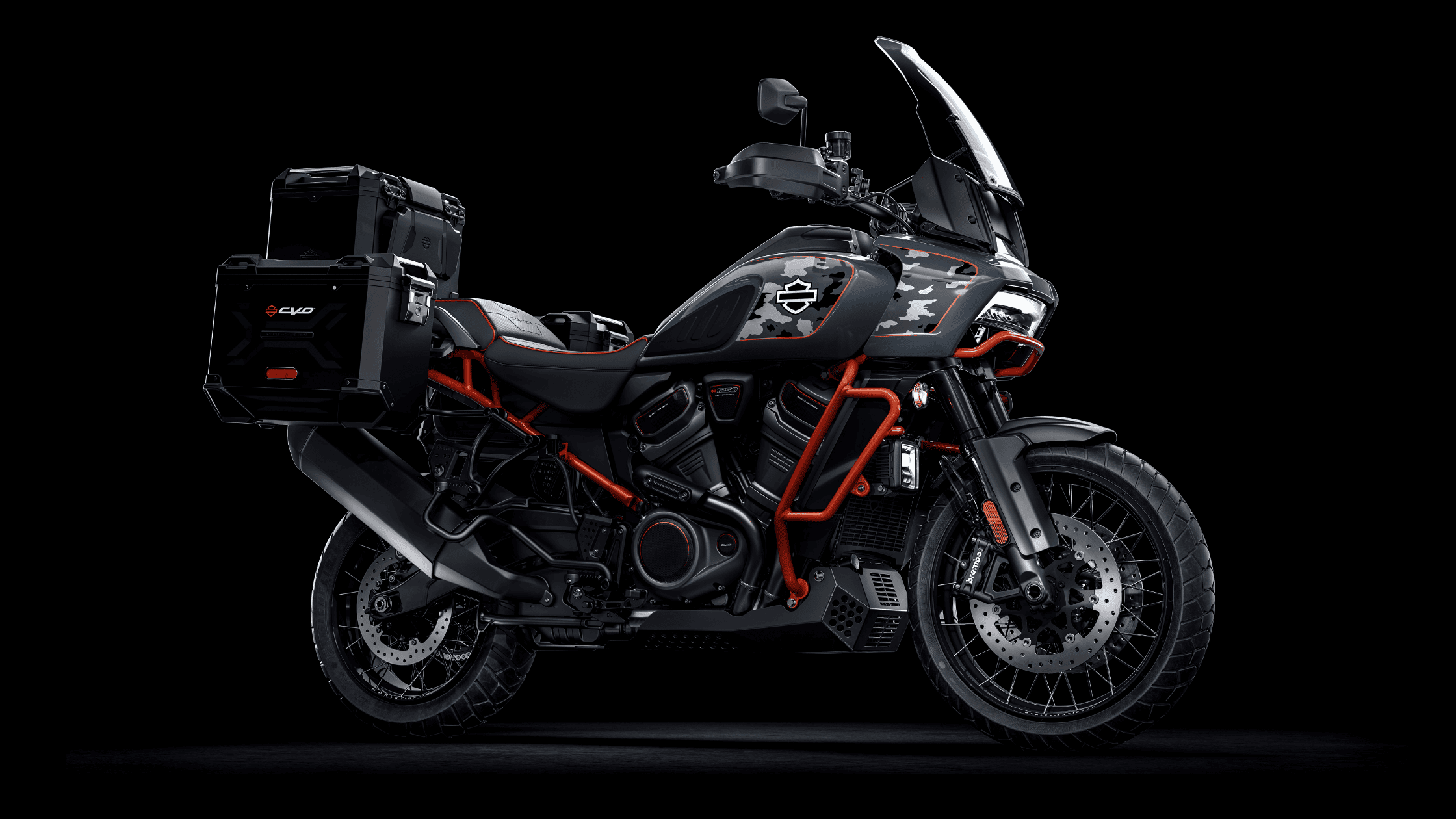 Side view of a camo and black 2025 Harley-Davidson® CVO™ Pan America® adventure touring motorcycle.