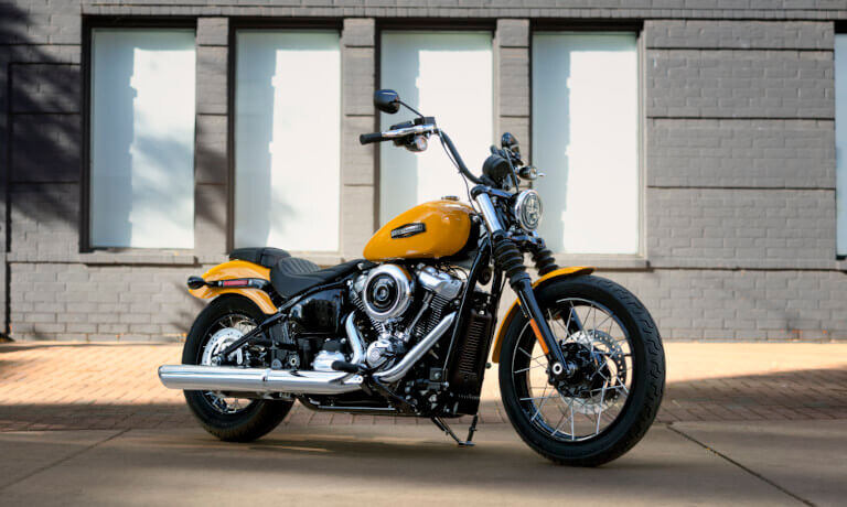 2025 Harley-Davidson Street Bob parked in front of brick building