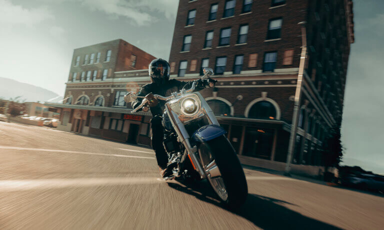 2025 Harley-Davidson Fat Boy turning in a town