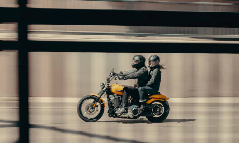 2025 Harley-Davidson Street Bob with two riders