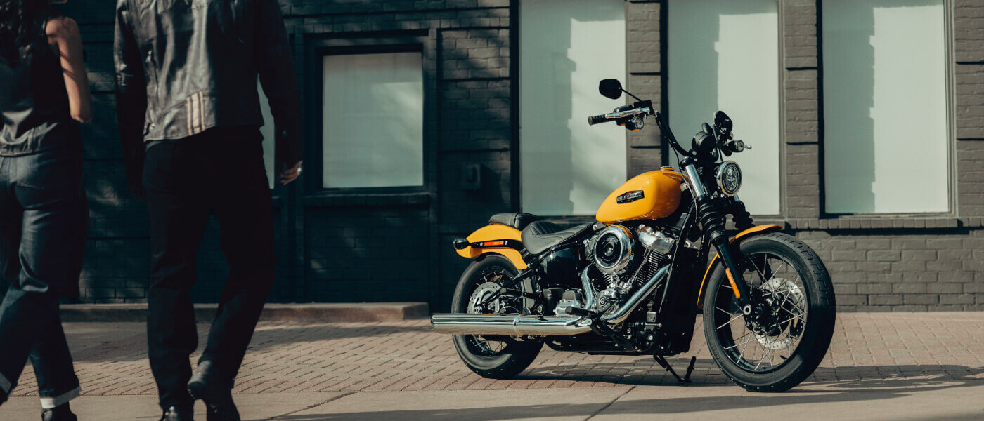 2025 Harley-Davidson Street Bob with approaching riders