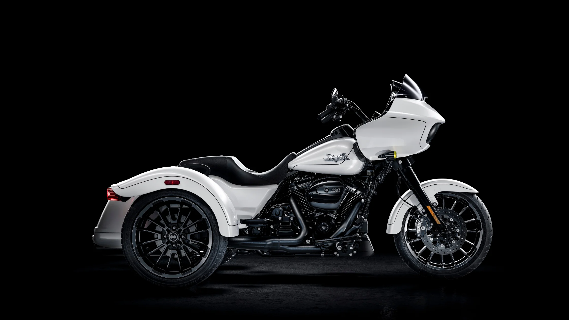 2025 Harley-Davidson Road Glide 3 trike in white with black accents on a black studio backdrop