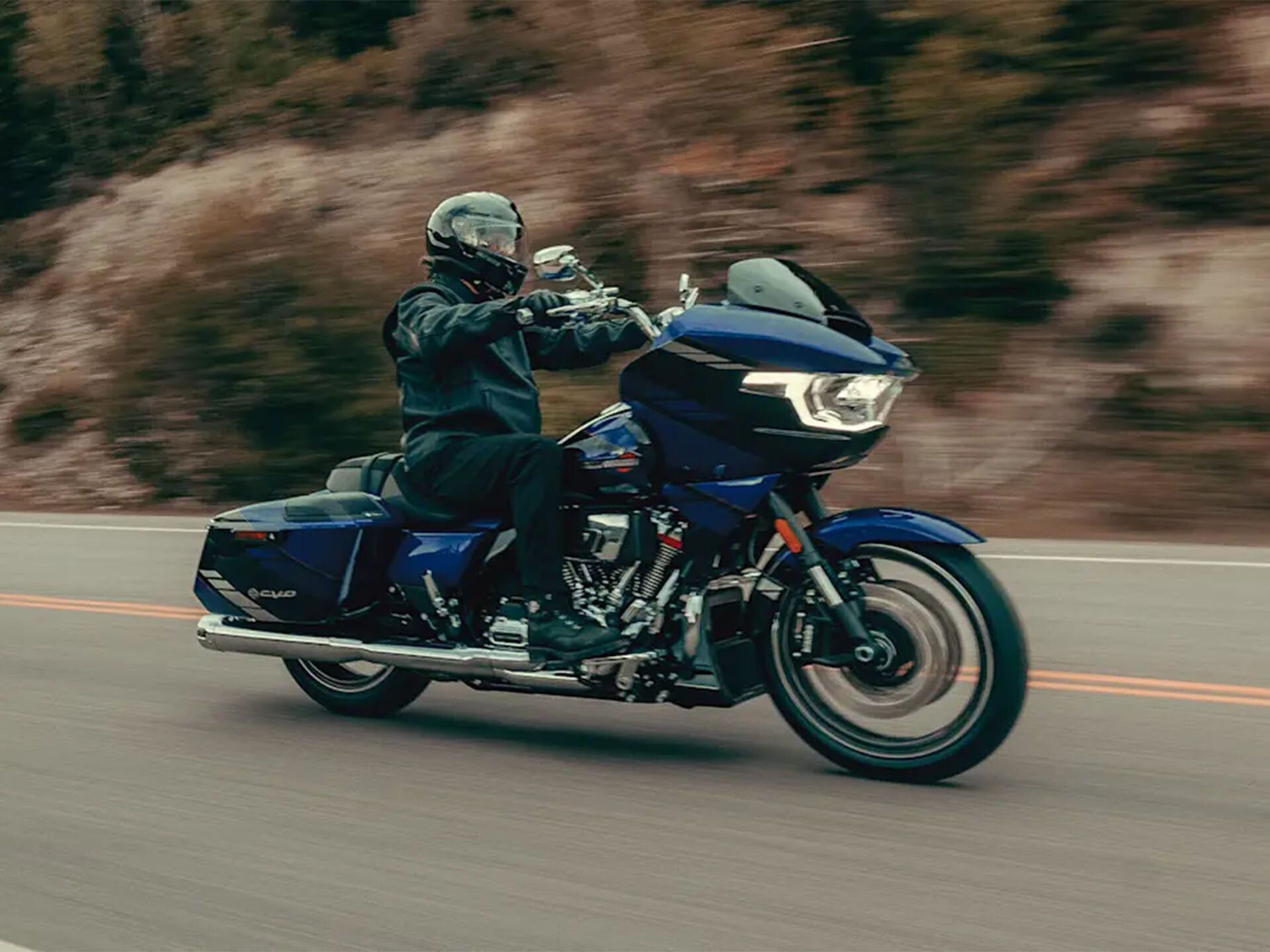 New Harley-Davidson motorcycle cruising on highway