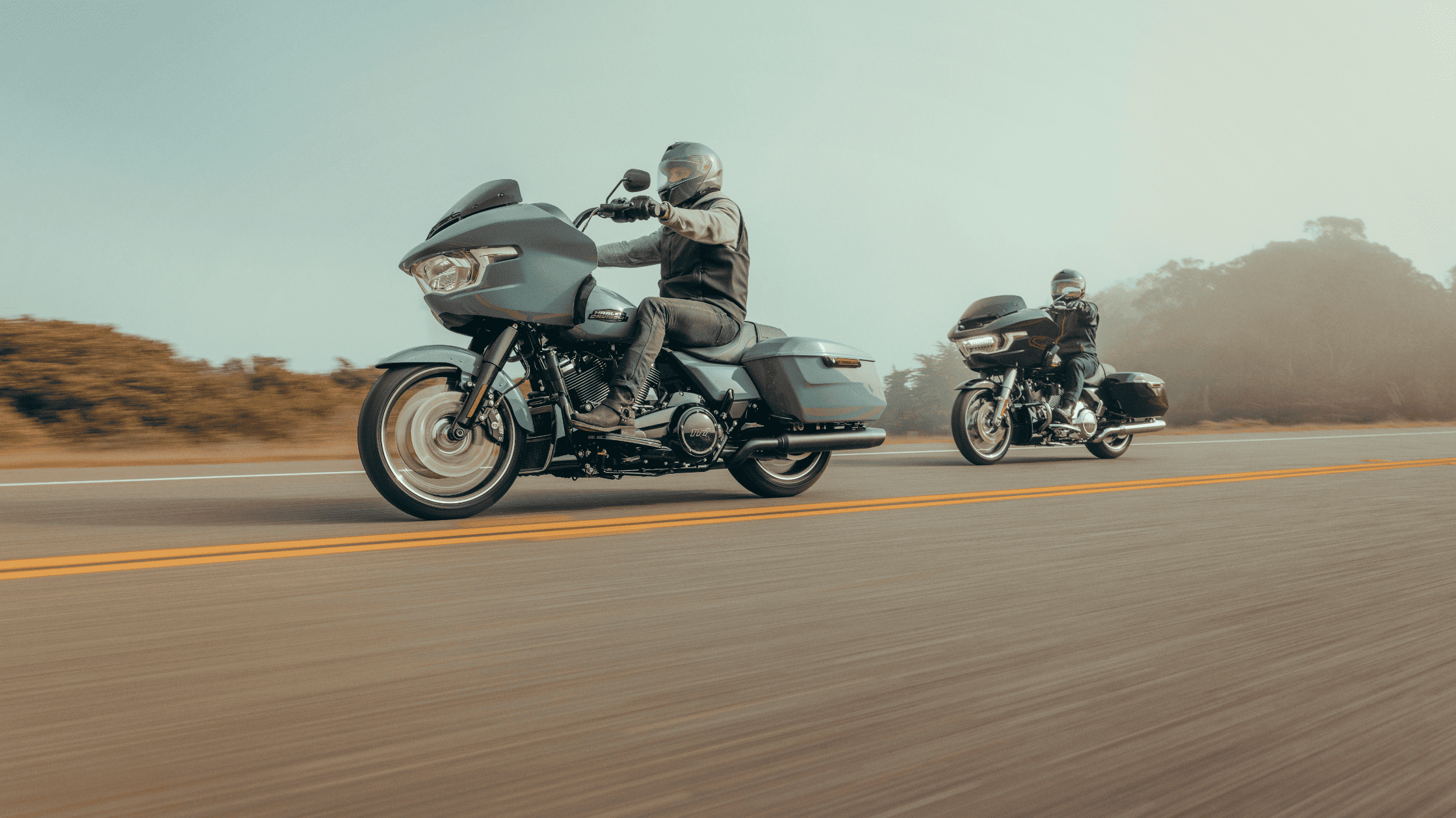 2025 Harley-Davidson® Road Glide® in black shown in a studio-lit profile, highlighting its sleek touring design near McDonough, GA.