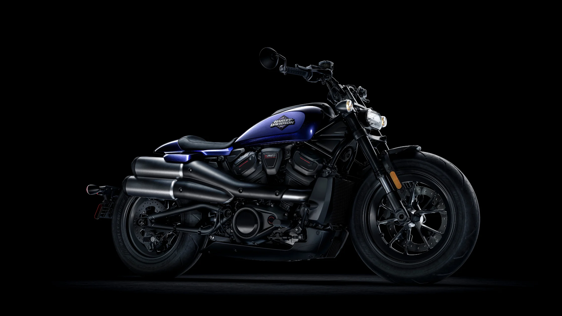 2025 Harley-Davidson® Sportster® S in blue with upswept exhaust and low stance