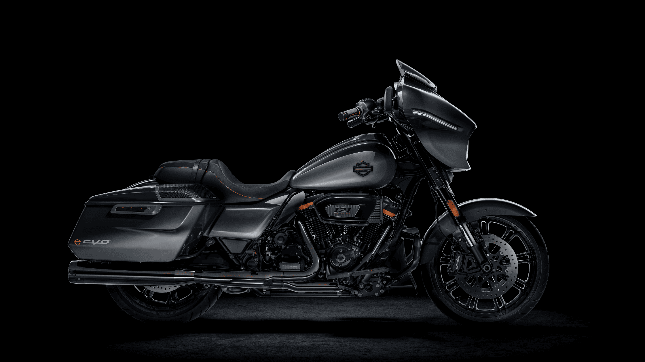 2025 Harley-Davidson® CVO™ Street Glide® in dark gray with custom touring seat, Milwaukee-Eight® 121 V-Twin engine, and blacked-out styling.