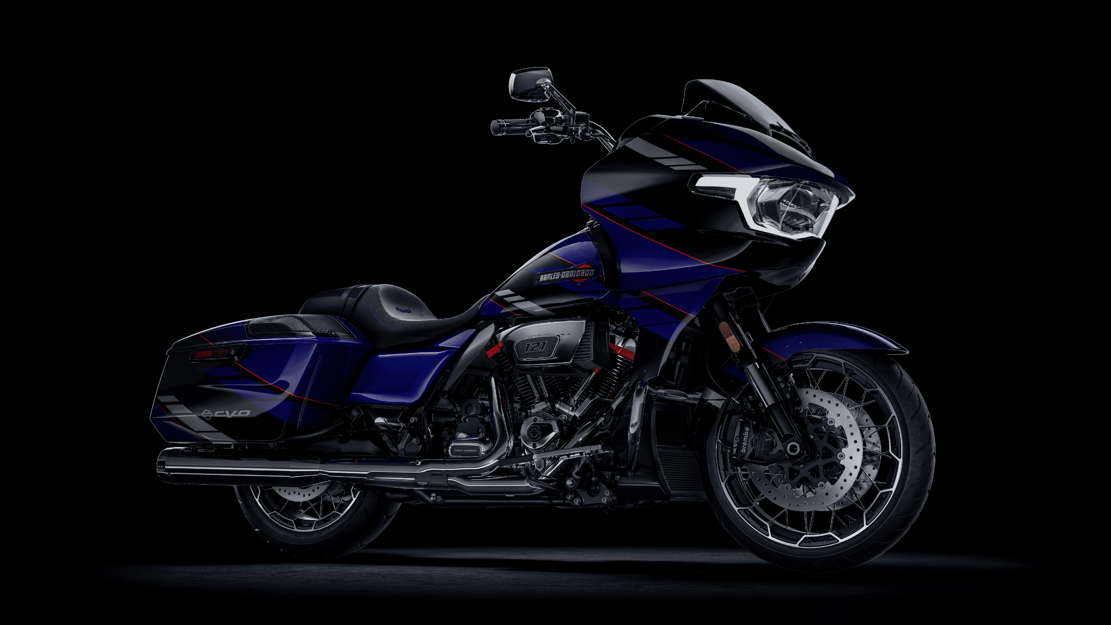 2025 Harley-Davidson® CVO™ Road Glide® in blue and black with Milwaukee-Eight® 121 V-Twin engine, sleek saddlebags, and modern LED headlamp.